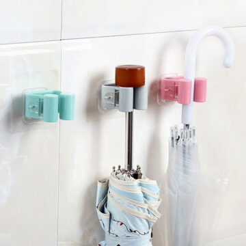 A wall - Mounted Mop & Broom Holder